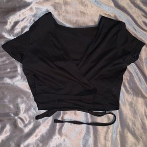 Cross body crop top.